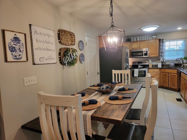 458 Fieldstone Dr, Ringgold, GA 30736 - dining area featuring light tile patterned floors and a chandelier