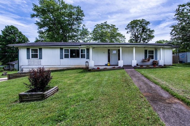 311 Birchwood St, Pikeville, TN 37367 - ranch-style house with covered porch and a front yard
