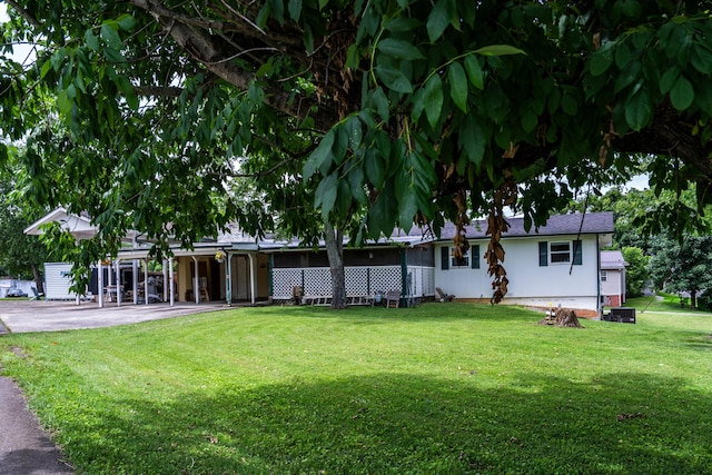 311 Birchwood St, Pikeville, TN 37367 - view of grassy yard with driveway
