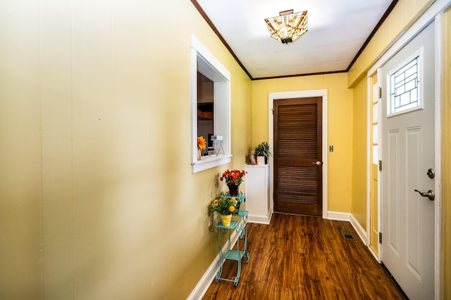 311 Birchwood St, Pikeville, TN 37367 - doorway with crown molding and dark wood-style floors
