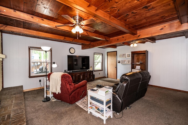 311 Birchwood St, Pikeville, TN 37367 - living area with a wood ceiling with exposed beams, a ceiling fan, healthy amount of natural light, carpet floors, and wood walls