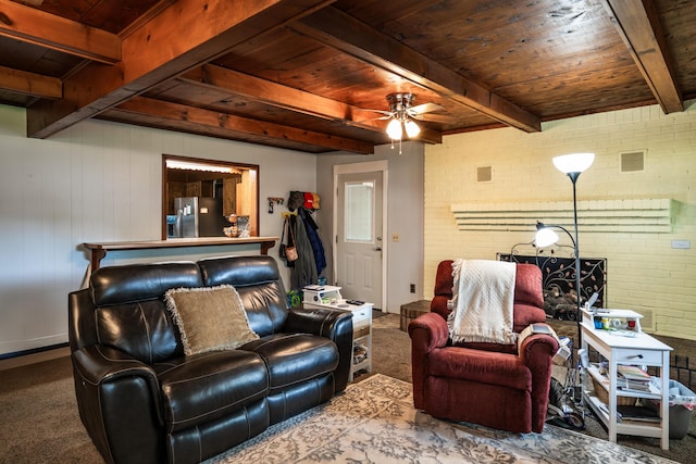 311 Birchwood St, Pikeville, TN 37367 - living room featuring a wood ceiling with exposed beams, carpet floors, a ceiling fan, and brick wall