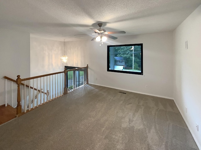 8127 Blue Spruce Dr, Hixson, TN 37343 - spare room with carpet flooring, a ceiling fan, and a textured ceiling