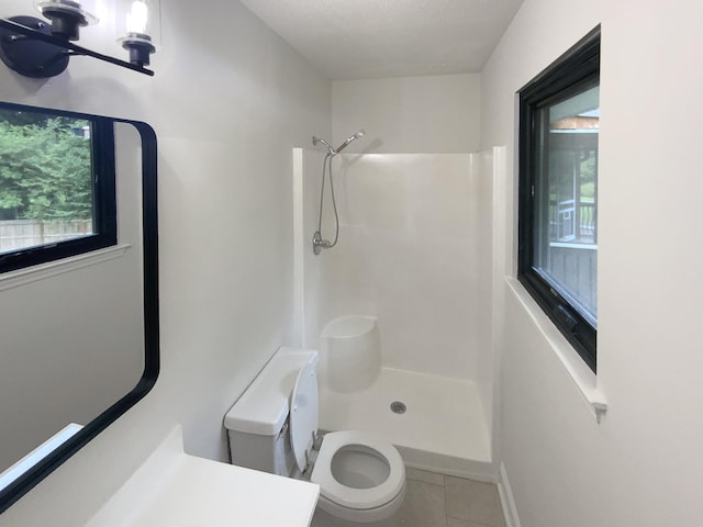 8127 Blue Spruce Dr, Hixson, TN 37343 - full bathroom with tile patterned flooring, a shower, and healthy amount of natural light