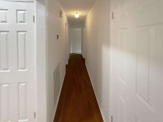 8127 Blue Spruce Dr, Hixson, TN 37343 - corridor with baseboards and dark wood finished floors