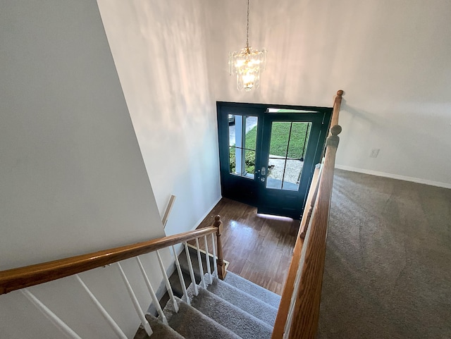 8127 Blue Spruce Dr, Hixson, TN 37343 - foyer entrance with a chandelier, wood finished floors, stairway, and a towering ceiling