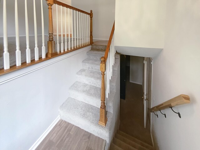 8127 Blue Spruce Dr, Hixson, TN 37343 - stairway with wood finished floors and baseboards