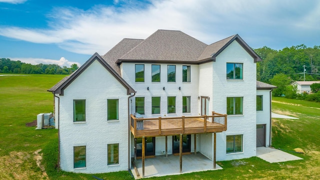 1524 Green Pond Rd, Soddy Daisy, TN 37379 - back of house with a patio area, a yard, a deck, brick siding, and a shingled roof