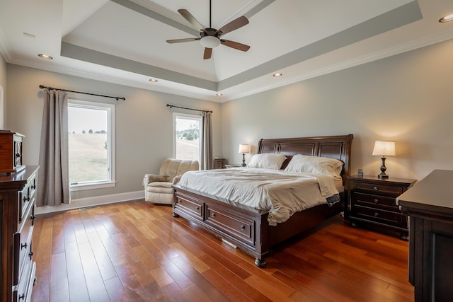 1524 Green Pond Rd, Soddy Daisy, TN 37379 - bedroom featuring a tray ceiling, dark wood-type flooring, ornamental molding, a ceiling fan, and recessed lighting