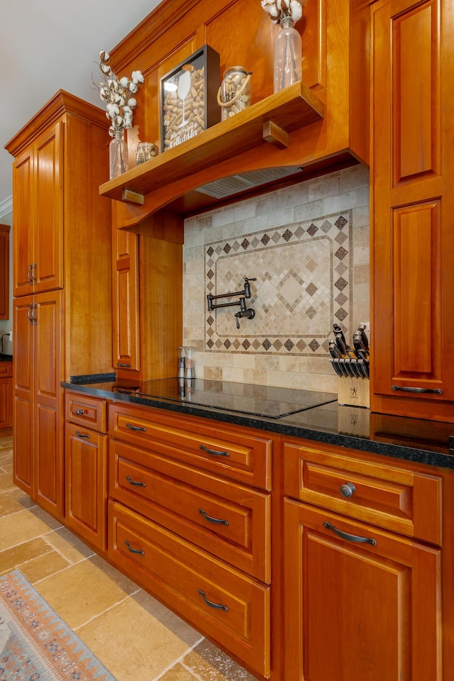 1524 Green Pond Rd, Soddy Daisy, TN 37379 - kitchen featuring decorative backsplash, brown cabinets, and dark stone countertops
