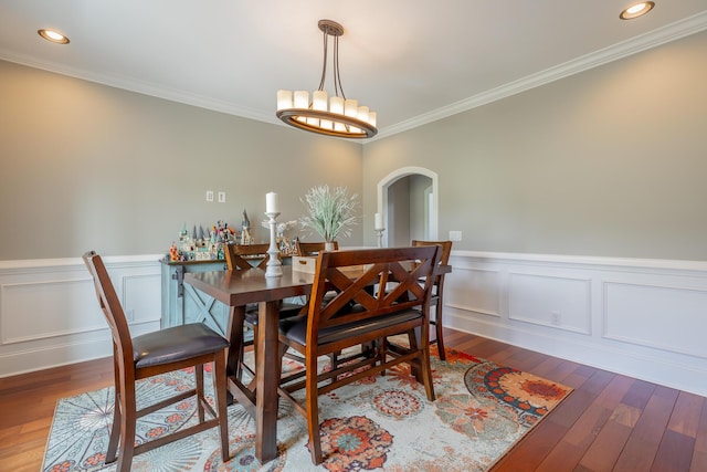 1524 Green Pond Rd, Soddy Daisy, TN 37379 - dining area featuring arched walkways, ornamental molding, hardwood / wood-style flooring, wainscoting, and recessed lighting