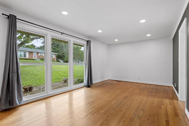 608 Maple Ln, Chattanooga, TN 37412 - spare room with light wood-style floors, recessed lighting, and ornamental molding
