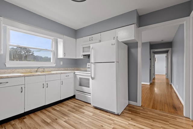 608 Maple Ln, Chattanooga, TN 37412 - kitchen featuring white appliances, light wood-style floors, light countertops, and white cabinetry