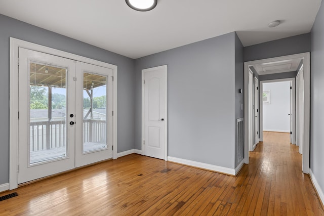 608 Maple Ln, Chattanooga, TN 37412 - foyer with french doors and light wood-style floors