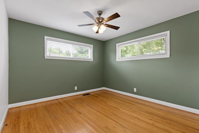 608 Maple Ln, Chattanooga, TN 37412 - empty room with plenty of natural light, light wood-type flooring, and a ceiling fan