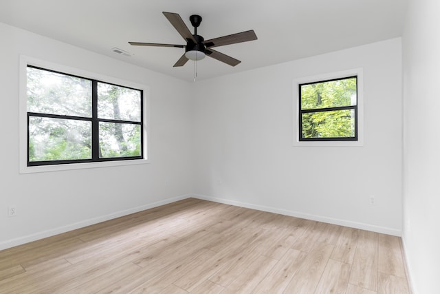 4217 W Rd, Signal Mountain, TN 37377 - spare room featuring light wood-style flooring and ceiling fan