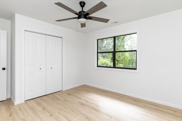 4217 W Rd, Signal Mountain, TN 37377 - unfurnished bedroom featuring light wood-style flooring, a closet, and ceiling fan