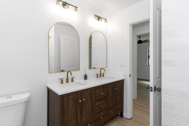 4217 W Rd, Signal Mountain, TN 37377 - full bath featuring double vanity, wood finished floors, and ceiling fan