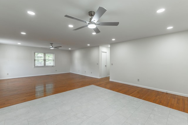 711 2nd St, South Pittsburg, TN 37380 - spare room featuring ceiling fan, wood finished floors, and recessed lighting