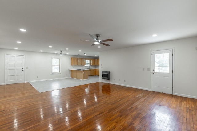 711 2nd St, South Pittsburg, TN 37380 - unfurnished living room with recessed lighting, a ceiling fan, healthy amount of natural light, light wood-style flooring, and heating unit