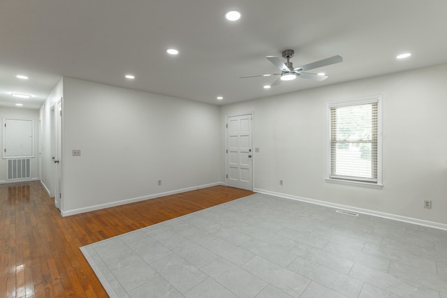711 2nd St, South Pittsburg, TN 37380 - spare room featuring ceiling fan, recessed lighting, and wood finished floors