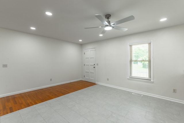 711 2nd St, South Pittsburg, TN 37380 - empty room with ceiling fan, recessed lighting, and light wood finished floors