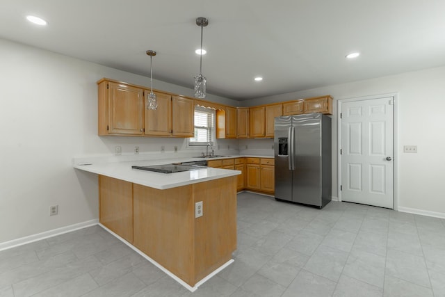 711 2nd St, South Pittsburg, TN 37380 - kitchen featuring stainless steel fridge with ice dispenser, a peninsula, light countertops, black electric stovetop, and recessed lighting