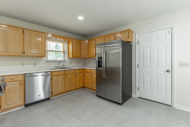 711 2nd St, South Pittsburg, TN 37380 - kitchen with stainless steel appliances, light countertops, light tile patterned floors, and recessed lighting