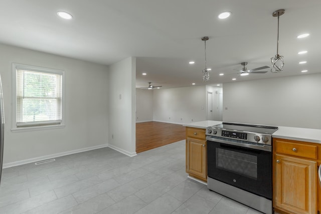 711 2nd St, South Pittsburg, TN 37380 - kitchen featuring stainless steel range with electric cooktop, a ceiling fan, open floor plan, recessed lighting, and light countertops