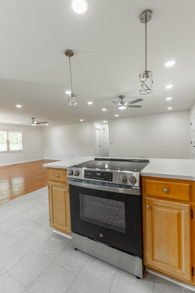 711 2nd St, South Pittsburg, TN 37380 - kitchen with electric range, open floor plan, light countertops, ceiling fan, and recessed lighting