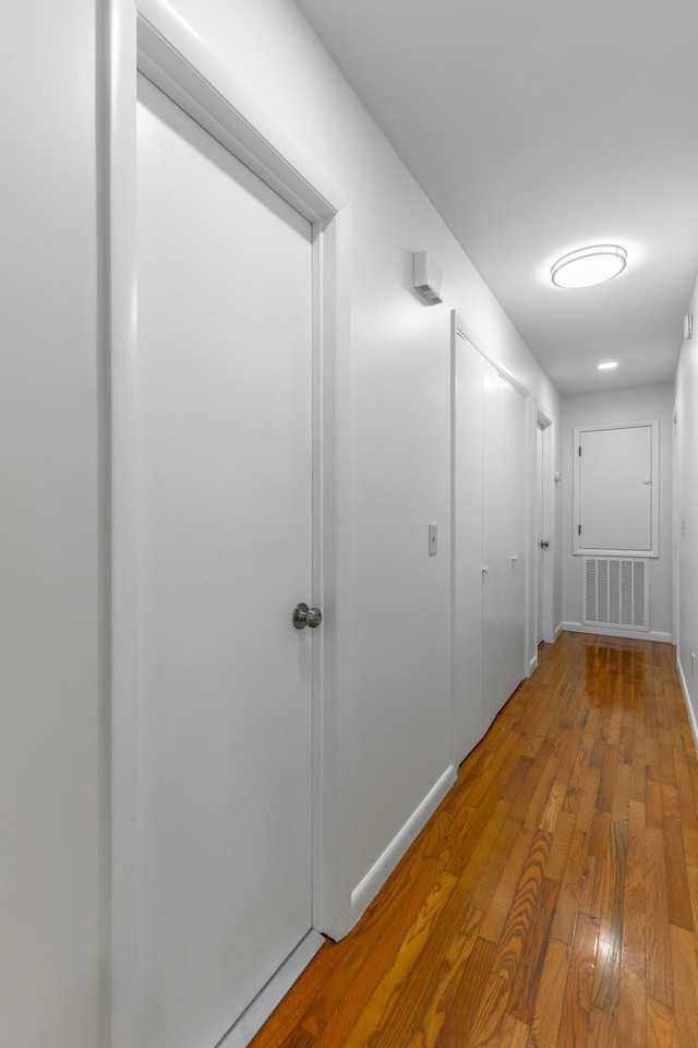 711 2nd St, South Pittsburg, TN 37380 - corridor featuring hardwood / wood-style flooring and baseboards