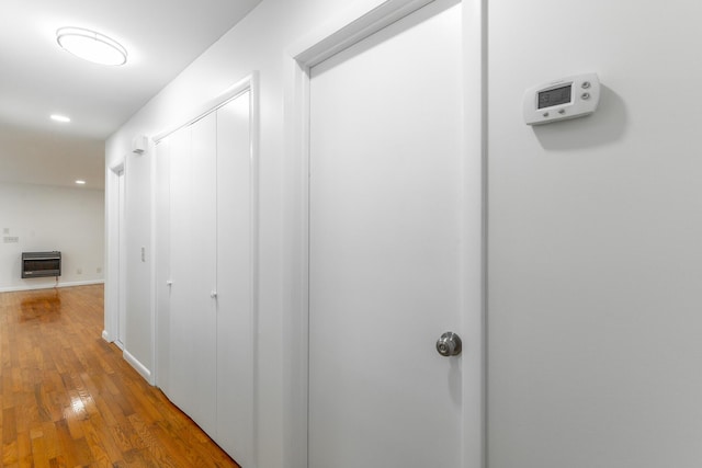 711 2nd St, South Pittsburg, TN 37380 - hallway with heating unit, wood finished floors, and recessed lighting