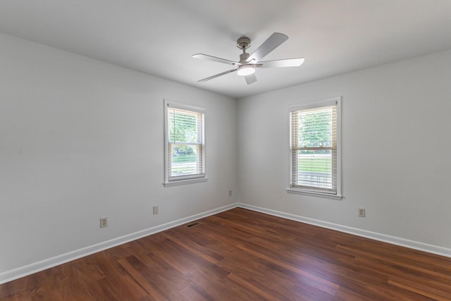 711 2nd St, South Pittsburg, TN 37380 - empty room featuring dark wood-type flooring and ceiling fan