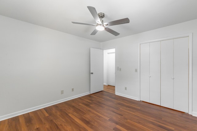 711 2nd St, South Pittsburg, TN 37380 - unfurnished bedroom featuring wood finished floors, a closet, and a ceiling fan