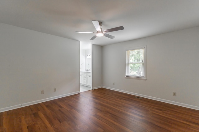 711 2nd St, South Pittsburg, TN 37380 - unfurnished room featuring dark wood finished floors and a ceiling fan