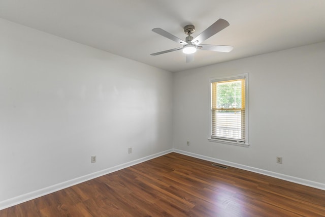 711 2nd St, South Pittsburg, TN 37380 - empty room featuring dark wood-style floors and a ceiling fan