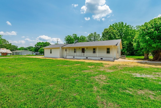 711 2nd St, South Pittsburg, TN 37380 - rear view of property with a lawn and crawl space