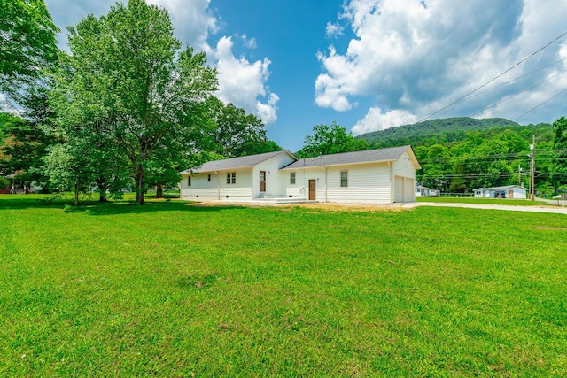 711 2nd St, South Pittsburg, TN 37380 - view of front of house with concrete driveway and a front lawn