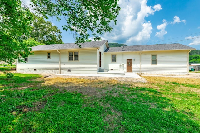 711 2nd St, South Pittsburg, TN 37380 - rear view of property featuring crawl space, a patio, and a yard