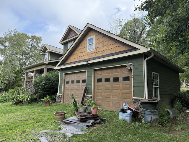 5492 Henson Gap Rd, Dunlap, TN 37327 - view of property exterior featuring a garage, stone siding, and a yard