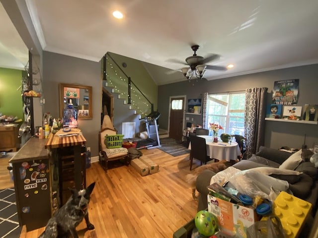 5492 Henson Gap Rd, Dunlap, TN 37327 - living area with crown molding, stairs, wood finished floors, ceiling fan, and recessed lighting