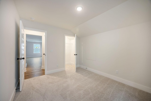 LOT3 Ari Ln, Chattanooga, TN 37421 - unfurnished bedroom with light colored carpet, vaulted ceiling, and a spacious closet