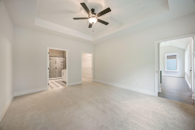 LOT3 Ari Ln, Chattanooga, TN 37421 - unfurnished bedroom featuring carpet, a raised ceiling, ensuite bath, a walk in closet, and ceiling fan