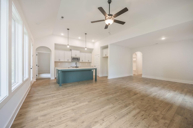 LOT3 Ari Ln, Chattanooga, TN 37421 - unfurnished living room featuring arched walkways, light wood-type flooring, recessed lighting, a ceiling fan, and vaulted ceiling