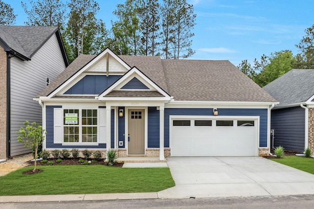 LOT3 Ari Ln, Chattanooga, TN 37421 - view of front of house with a garage, roof with shingles, driveway, a front lawn, and brick siding