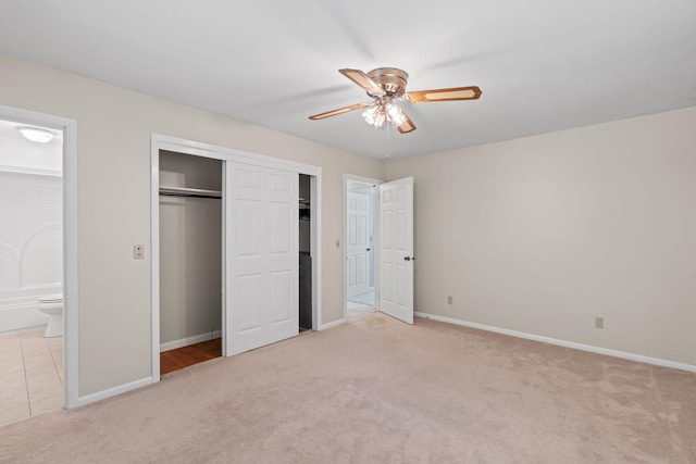 4838 Glenmar Cir, Chattanooga, TN 37416 - unfurnished bedroom featuring light carpet, ensuite bath, a closet, and ceiling fan