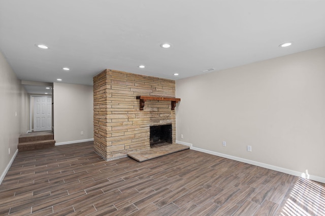 4838 Glenmar Cir, Chattanooga, TN 37416 - unfurnished living room featuring wood finished floors, a fireplace, and recessed lighting