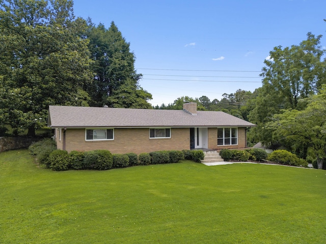 4838 Glenmar Cir, Chattanooga, TN 37416 - ranch-style house featuring a front lawn, brick siding, and a chimney