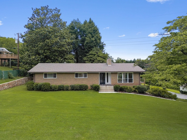 4838 Glenmar Cir, Chattanooga, TN 37416 - ranch-style home with a front yard, brick siding, and a chimney