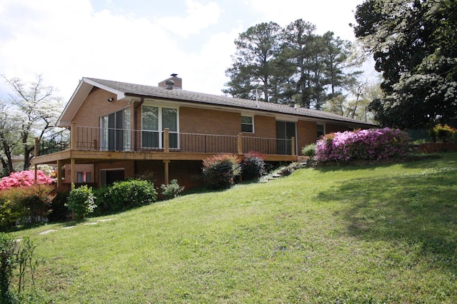 4838 Glenmar Cir, Chattanooga, TN 37416 - rear view of property featuring brick siding, a lawn, a chimney, and a deck